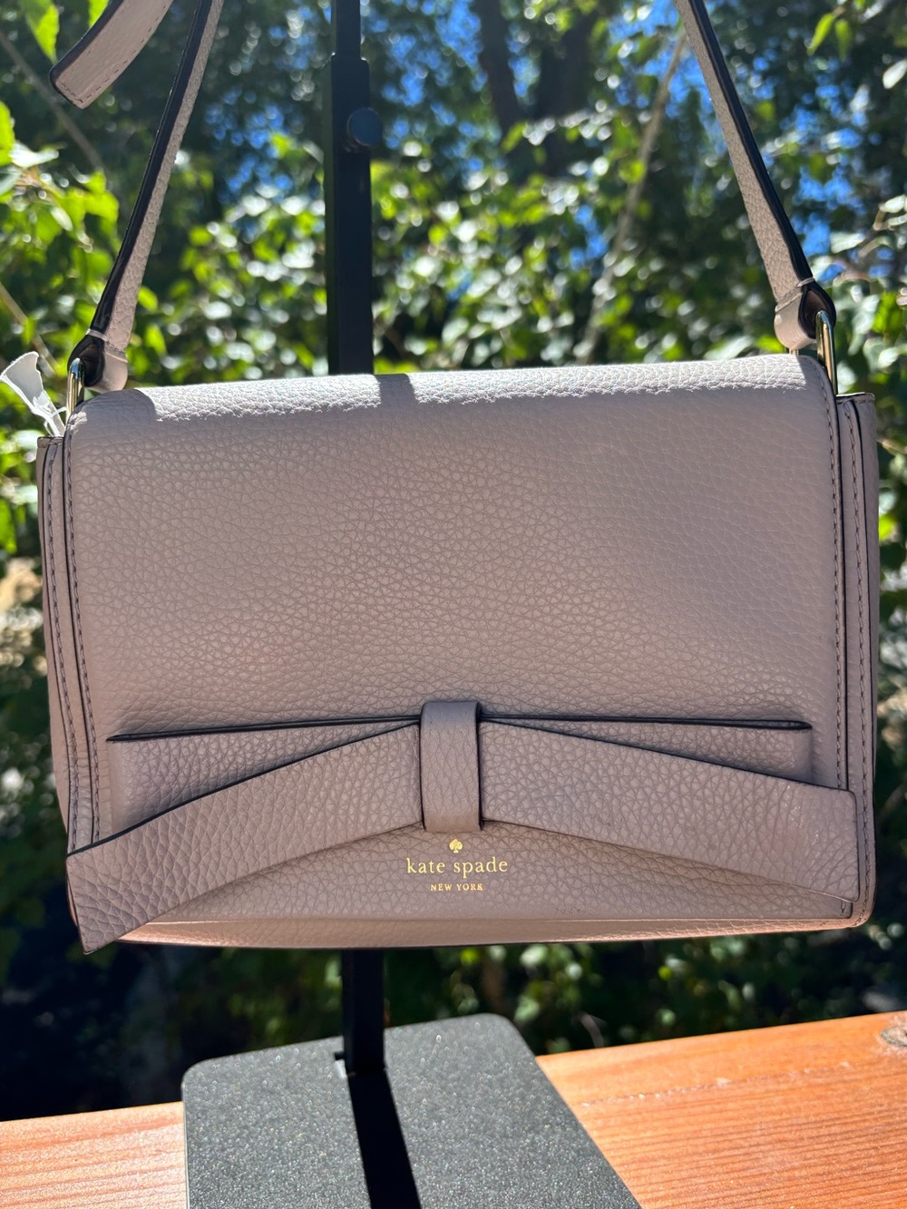 kate spade Peony GRAY with pink interior Pebbled Leather Bow Crossbody